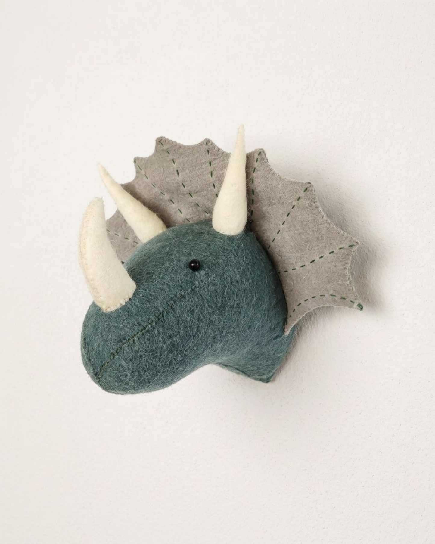 Djurhuvud i ull, triceratops