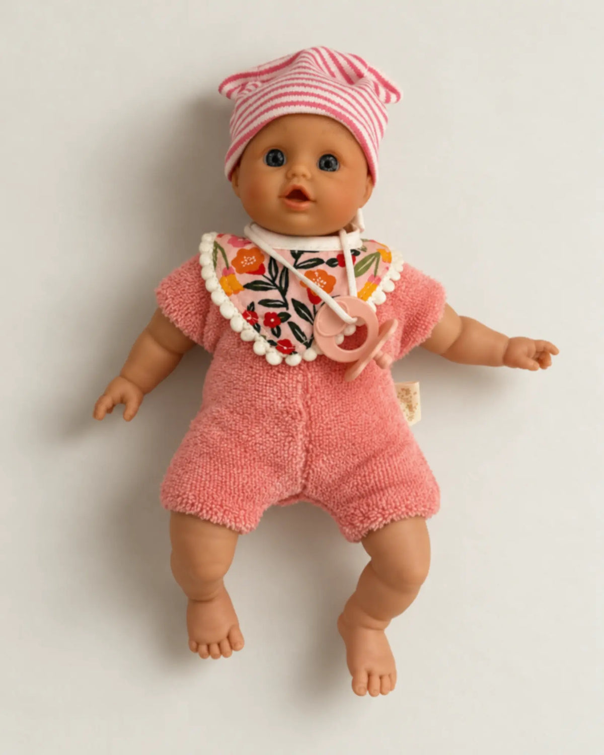 Mjuk babydocka i mörkrosa med napp, bild 2