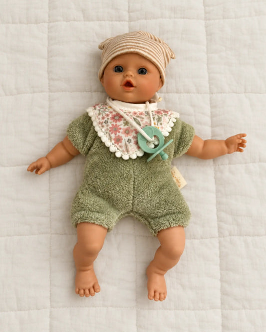 Mjuk babydocka i grönt med napp för de minsta