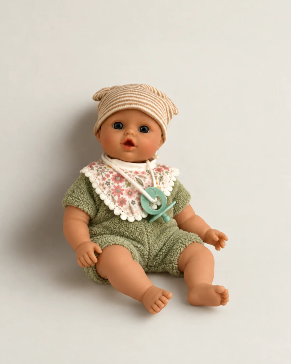 Mjuk babydocka i grönt med napp, bild 2