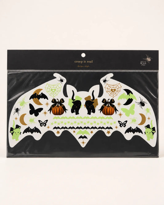 Halloweentatueringar med spöken, pumpor och fladdermöss